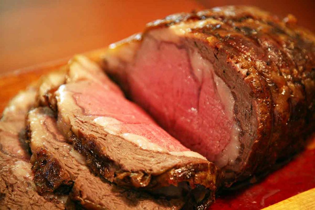 Sliced Holiday Prime Rib Medium Rare.