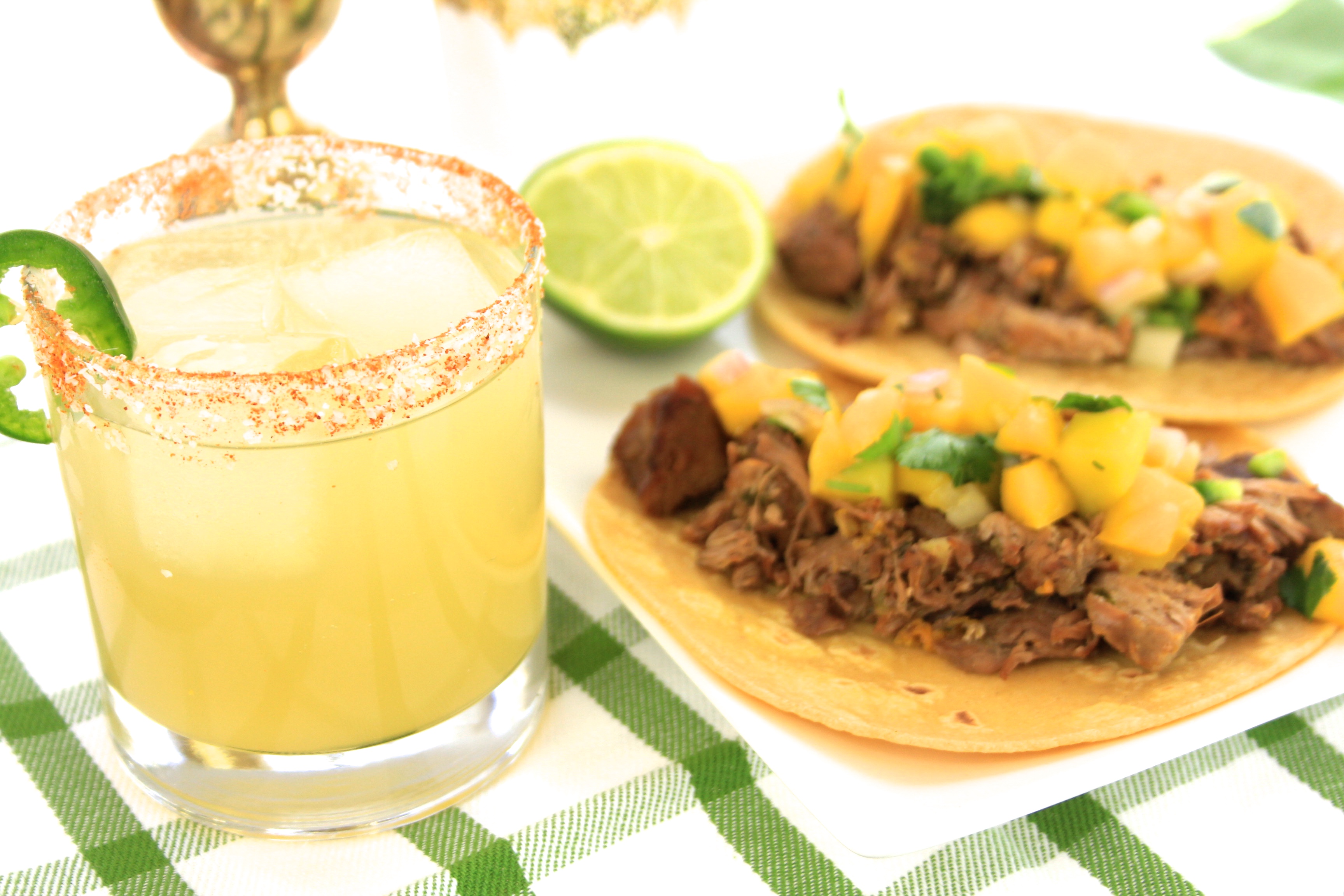 Spicy Apricot Margarita recipe paired with Killer Carnitas Tacos and Mango Salsa for Cinco De Mayo celebration