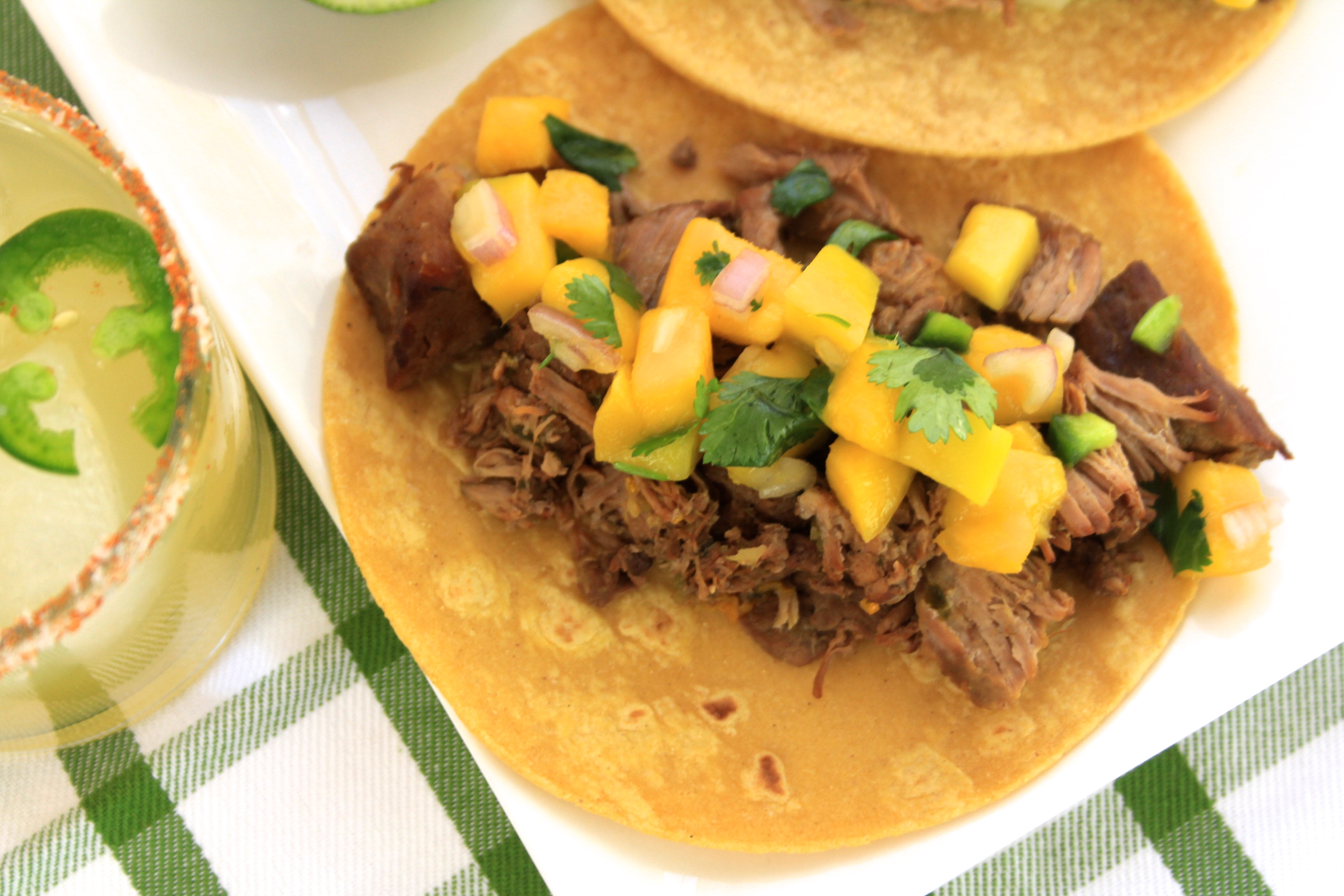 Killer Carnitas Tacos with Mango Salsa cinco de mayo recipe featuring margarita with essensia orange muscat