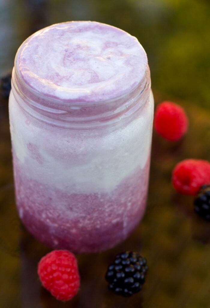 Red Electra Moscato float recipe with vanilla icecream surrounded by raspberries and black berries.