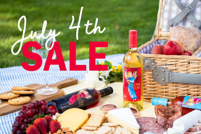 Picnic setting with bottles of Electra Moscato and text overlay, "4th of July Sale."