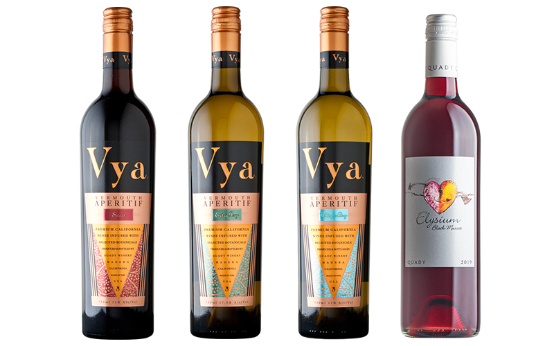 3 vya bottles in line next to a elysium bottle