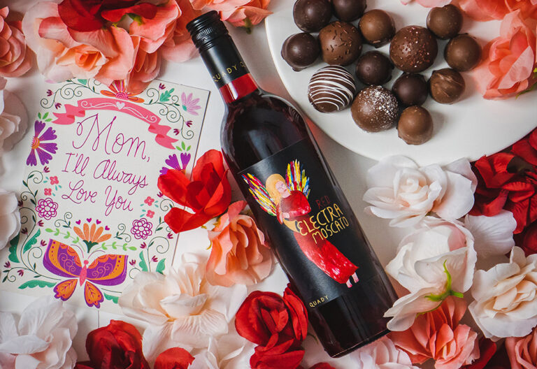 Red Electra with flowers and chocolates for Mother's Day