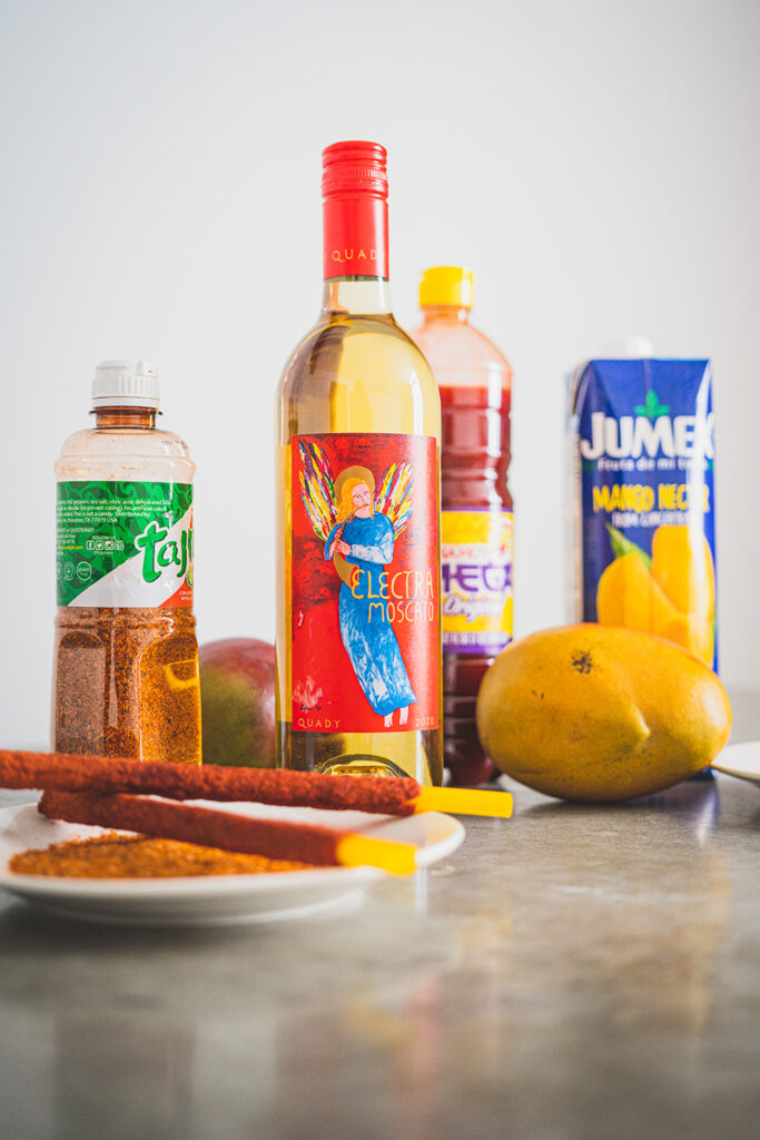 Ingredients for making an Electra Mangonada - Electra Moscato, Tajin, Chamoy, Mangos, Mango Nectar