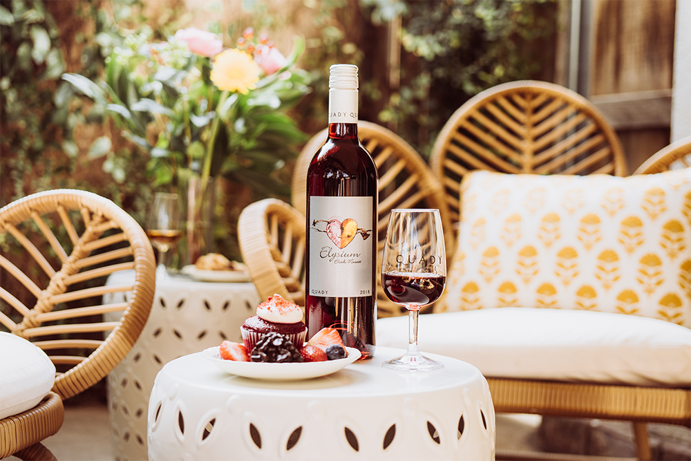 Elysium Black Muscat with fruit and a cupcake.